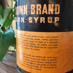 "Image: Antique Crown Brand Corn Syrup Can - Vintage metal can with weathered label, embodying nostalgia and Americana history, evoking memories of traditional kitchen essentials."