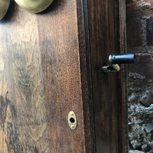 Load image into Gallery viewer, &quot;Image: Antique 1900s Northern Electric Wall Mount Crank Wood Cabinet Telephone. A vintage wood cabinet telephone with intricate detailing, crank mechanism, and brass accents, capturing the essence of a bygone era and serving as a functional conversation piece and decorative treasure.&quot;