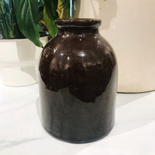 Load image into Gallery viewer, Image: Antique Small Brown Liquids Crock - A vintage crock with rustic appeal, showcasing deep brown hue and utilitarian design.&quot;