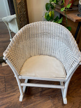 Load image into Gallery viewer, &quot;Image: Vintage White 1940’s Child&#39;s Wicker Rocking Chair from Eaton’s Montreal. A charming miniature rocking chair with wicker weaving, showcasing nostalgic craftsmanship and a touch of history.&quot;