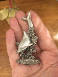 Pewter Dolphin in Waves