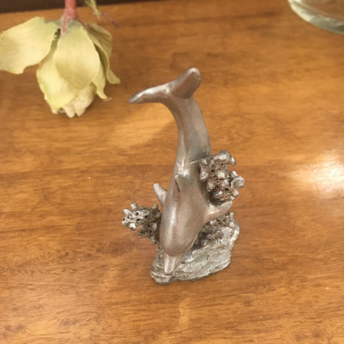 Pewter Dolphin in Waves