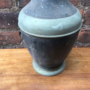 "Image: Antique Stanley Ferrostat Insulated Thermos from 1913 - Vintage thermos with intricate design, reflecting enduring quality and functionality."